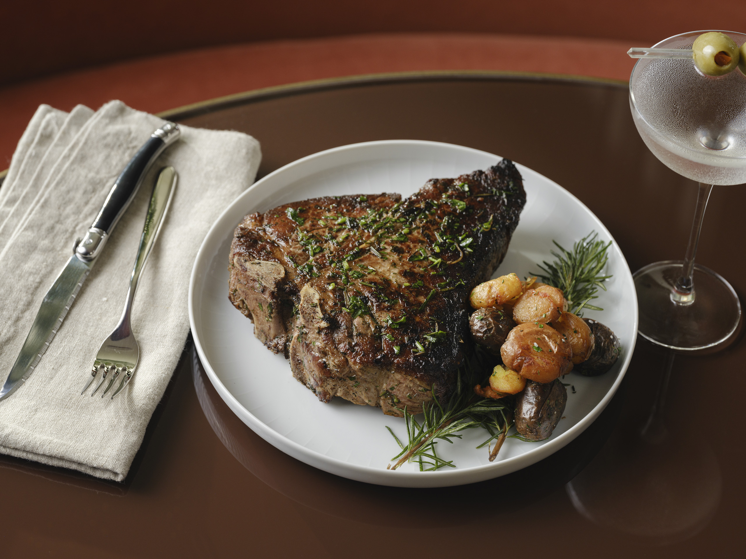 Grilled steak with potatoes and martini