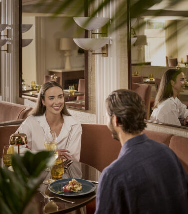 Couple dining in Costa Covo restaurant booth