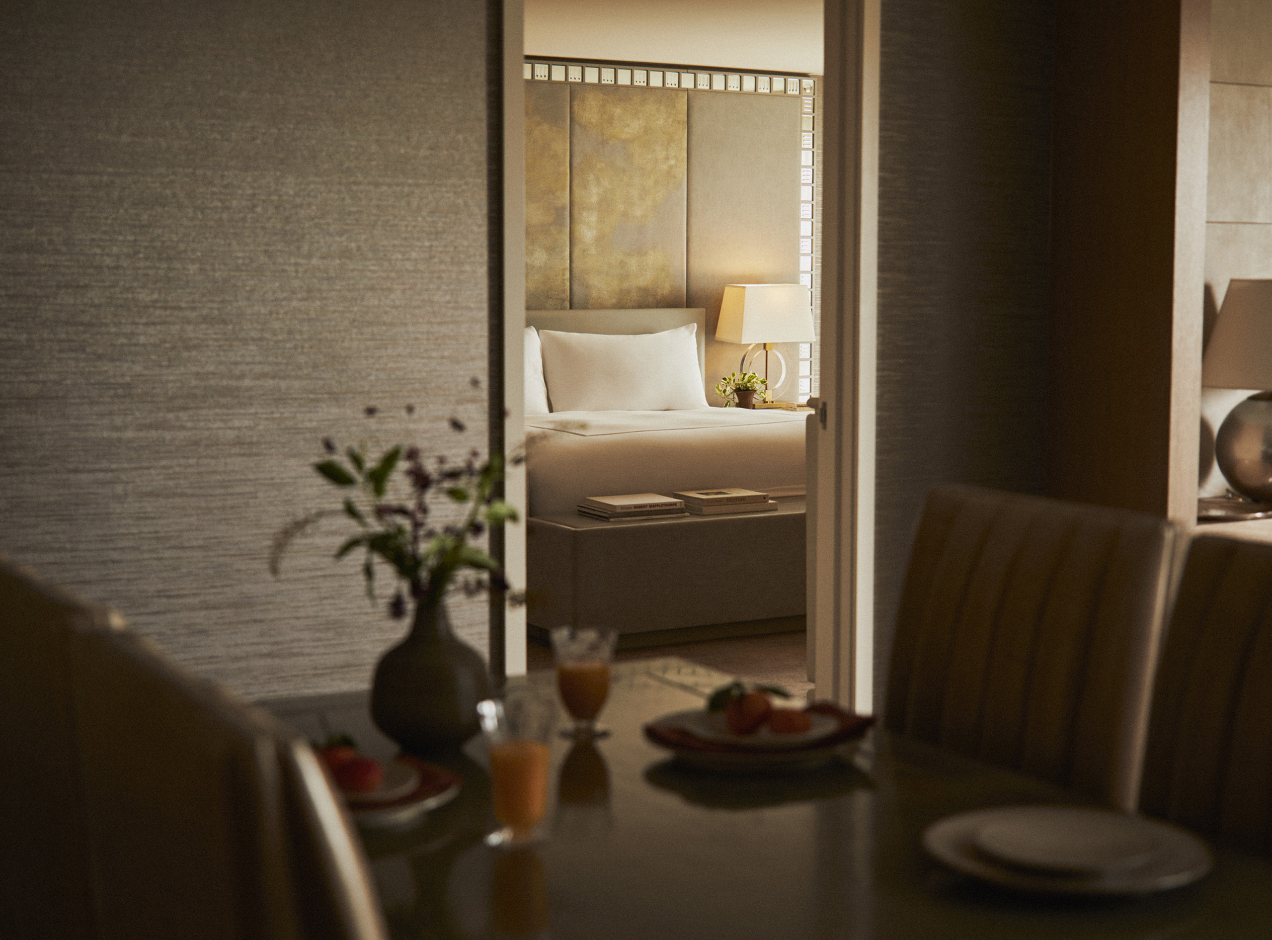 View through dining area toward bedroom doorway