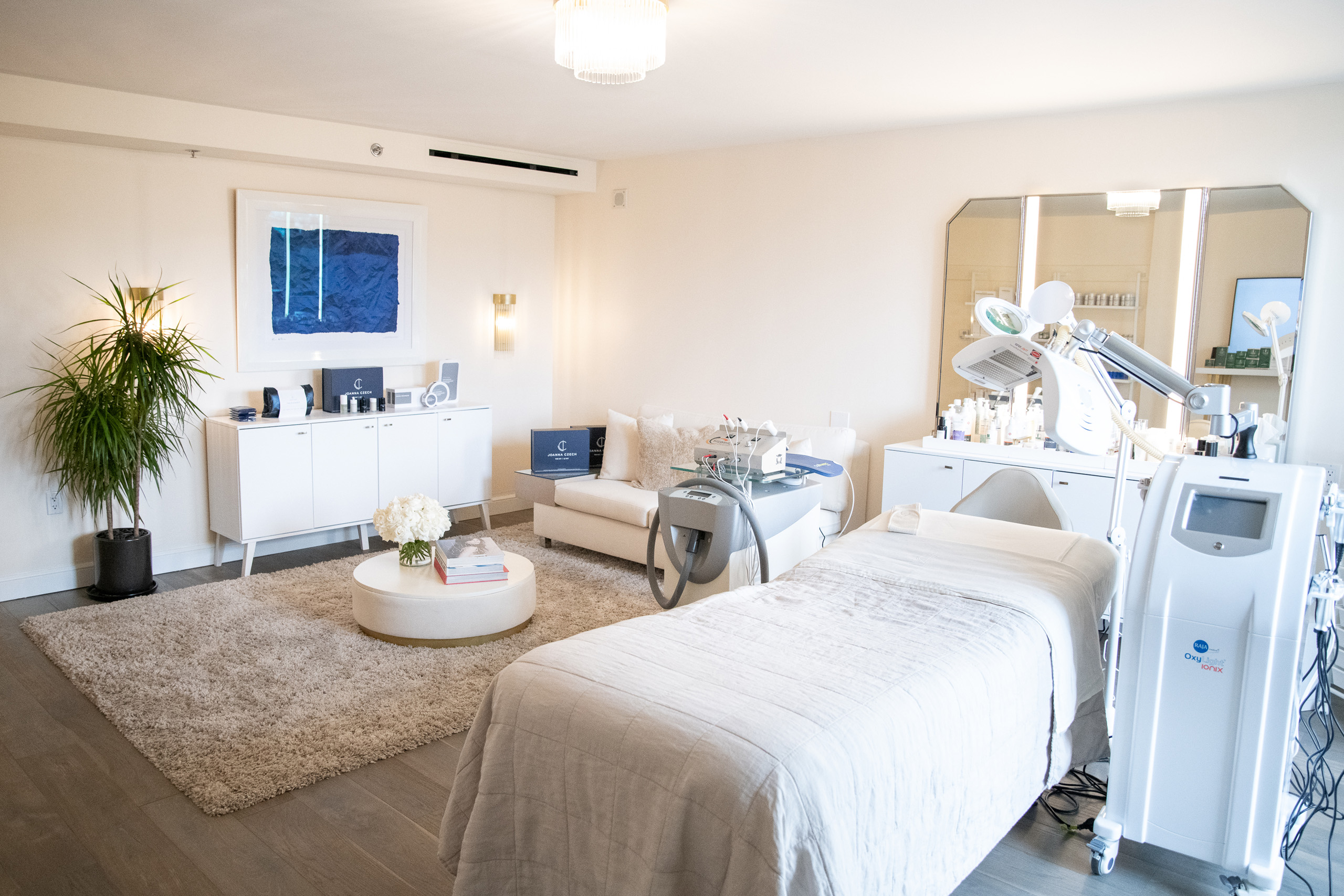 Wide view of Joanna Czech studio with treatment bed and devices