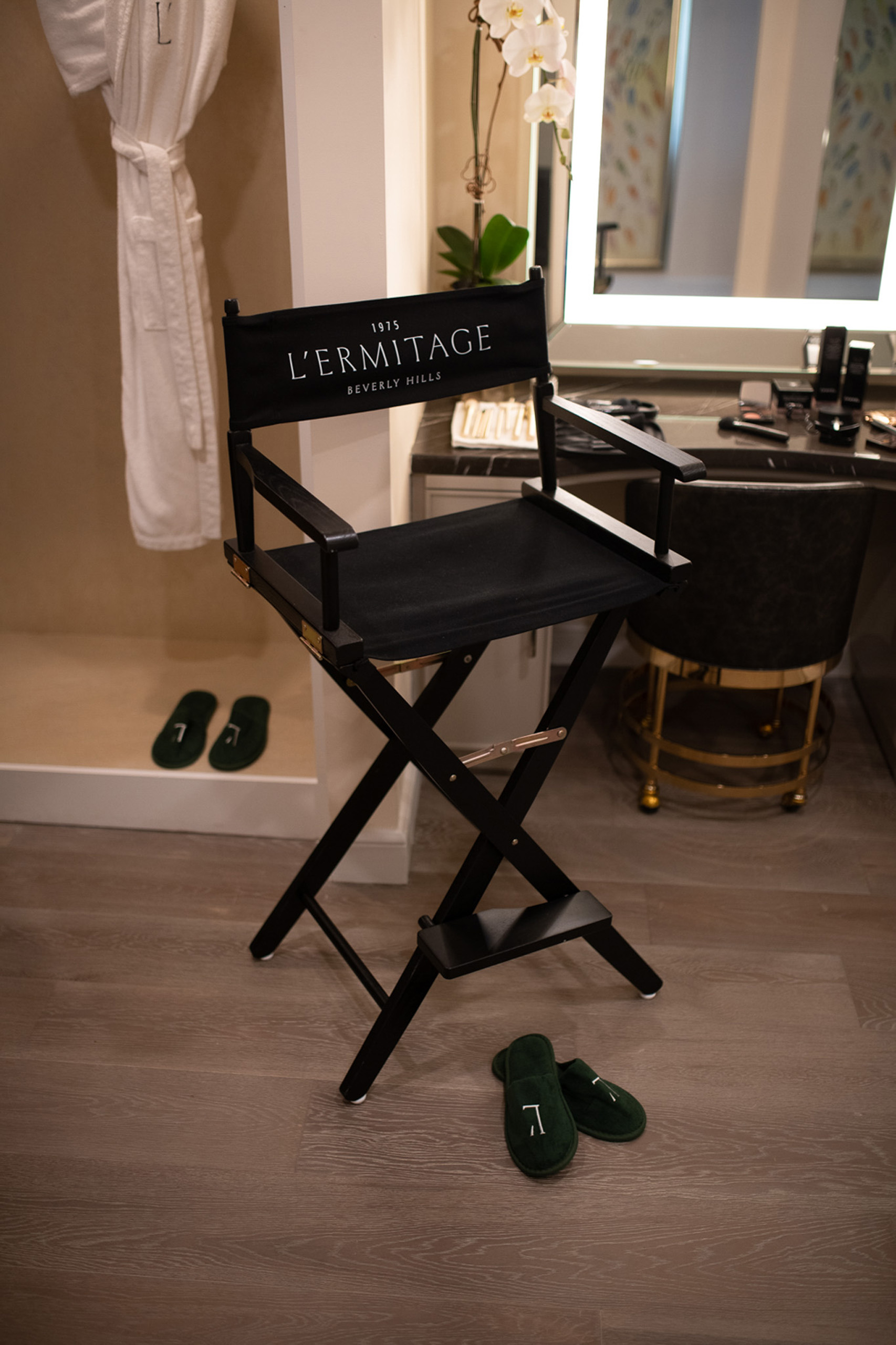 L’Ermitage director’s chair by vanity and robe.